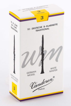 Eine weiße Pappschachtel für Klarinettenblätter mit gelbem Akzentstreifen oben zeigt eine Abbildung einer Klarinette, den Text "Vandoren PARIS", die Bezeichnung "10-DEUTSCHE B-KLARINETTE TRADITIONAL" und die Zahl "3".