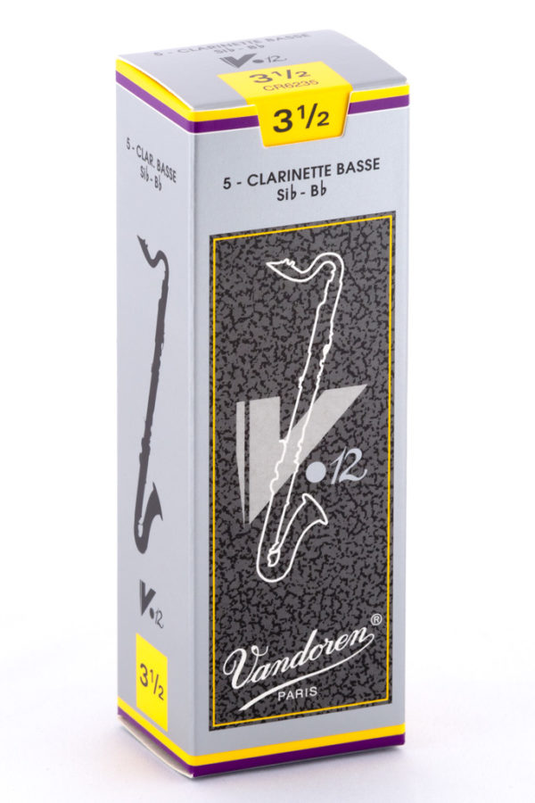 Ein grauer Karton mit gelben und violetten Akzenten zeigt eine stilisierte, weiße Zeichnung einer Bassklarinette und den Schriftzug "Vandoren Paris" sowie die Aufschrift "3 1/2".