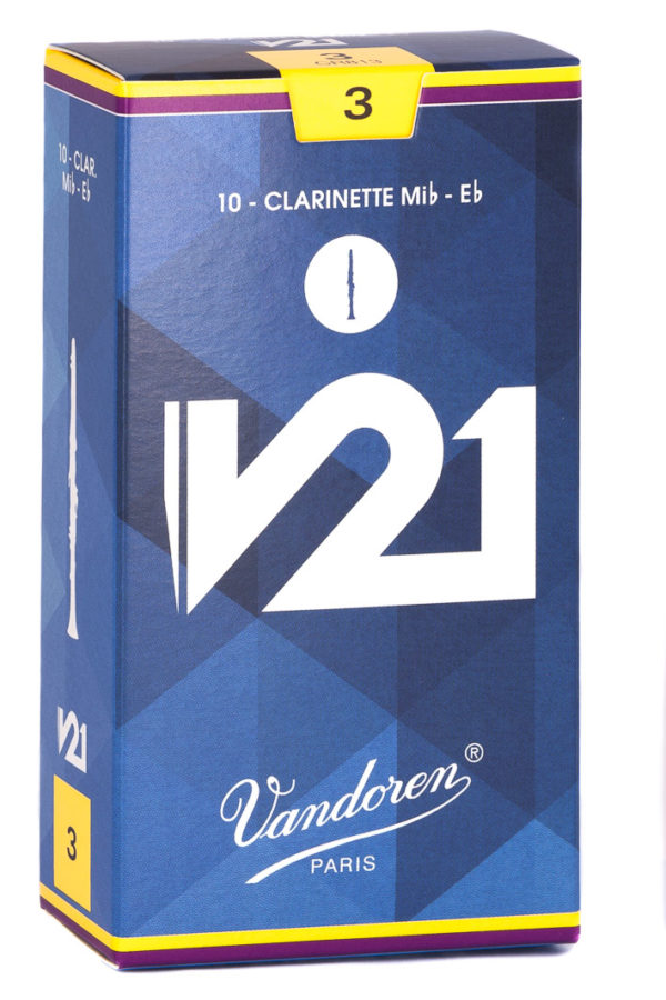 Eine blaue Verpackung für 10 Klarinettenblätter der Marke Vandoren V21 für Mib-Eb Klarinette mit der Stärke 3, akzentuiert durch gelbe Ränder und geometrische Muster.