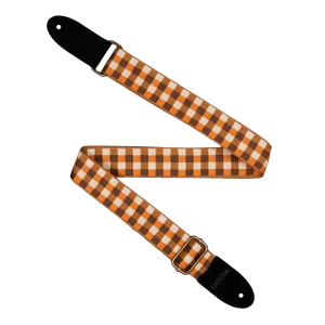 Ein orange-braun karierter Ukulelengurt der Marke Cascha, Modell CUS-JW4, mit schwarzen Lederenden und goldenen Metallschnallen, liegt auf einem schwarzen Hintergrund.