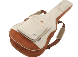 Die Ibanez IAB541-BE Tasche in Beige und Braun, in Gitarrenform, besitzt eine aufgesetzte Tasche und Trageriemen.